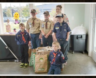 A group of scouts posing for a picture.